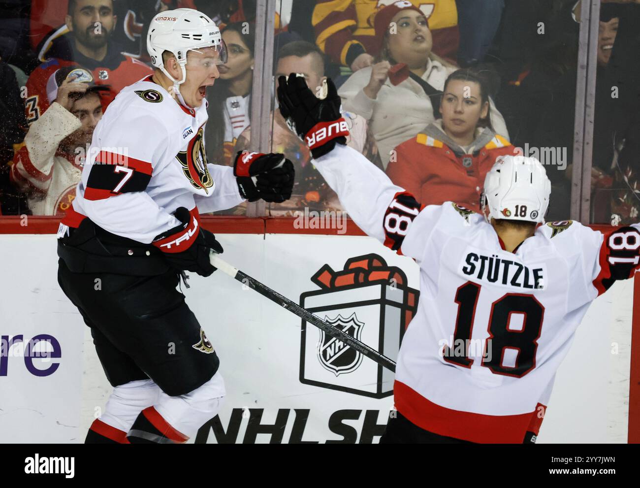 Ottawa Senators' Brady Tkachuk, left, celebrates after his winning goal ...