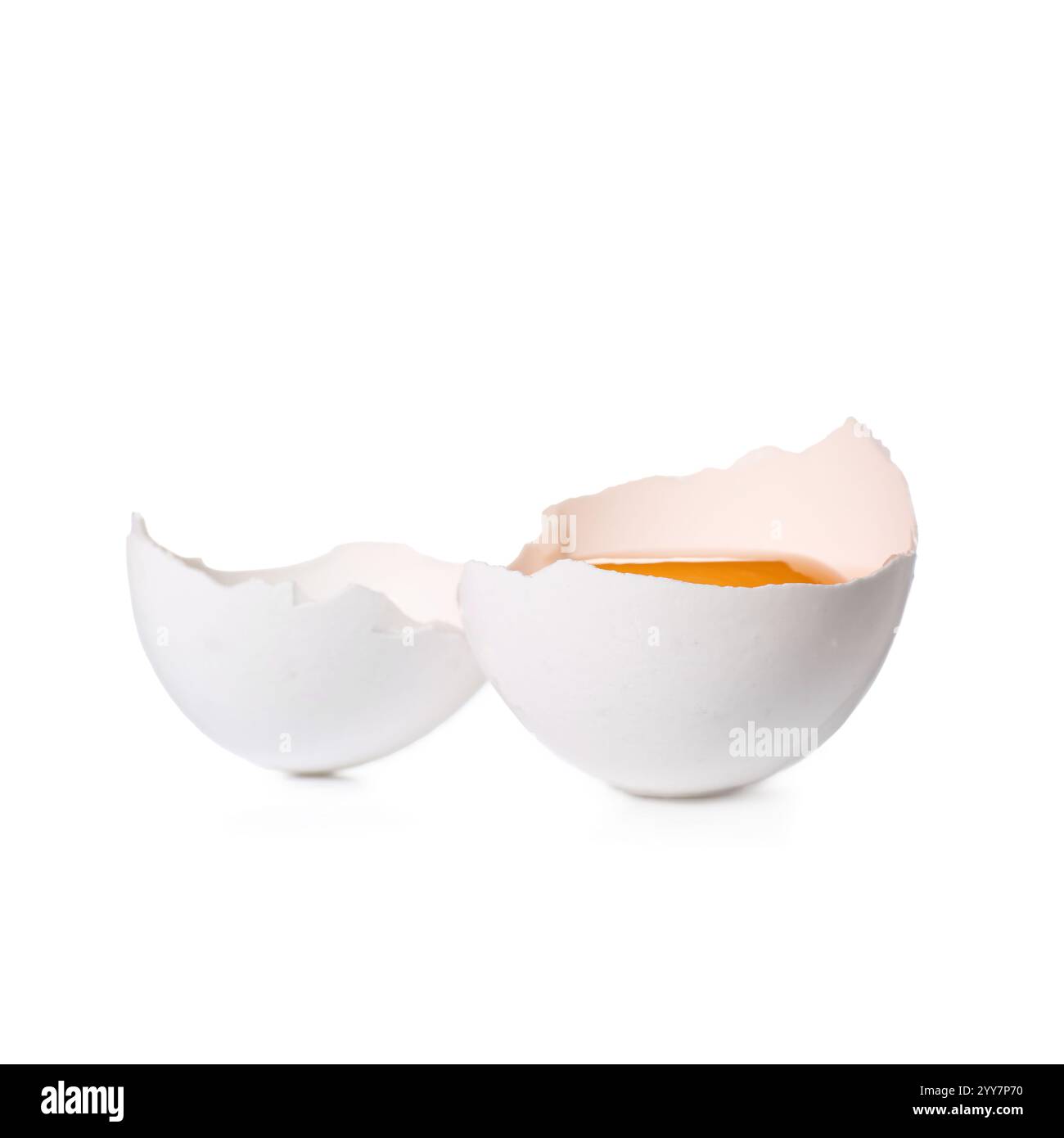 Cracked chicken egg isolated on white background Stock Photo - Alamy