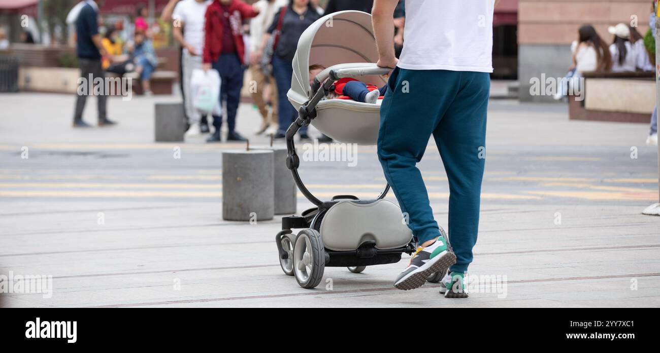 Kid sleeping stroller hi-res stock photography and images - Alamy