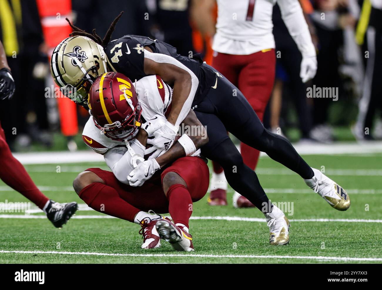 Washington Commanders cornerback Mike Sainristil (0) with the