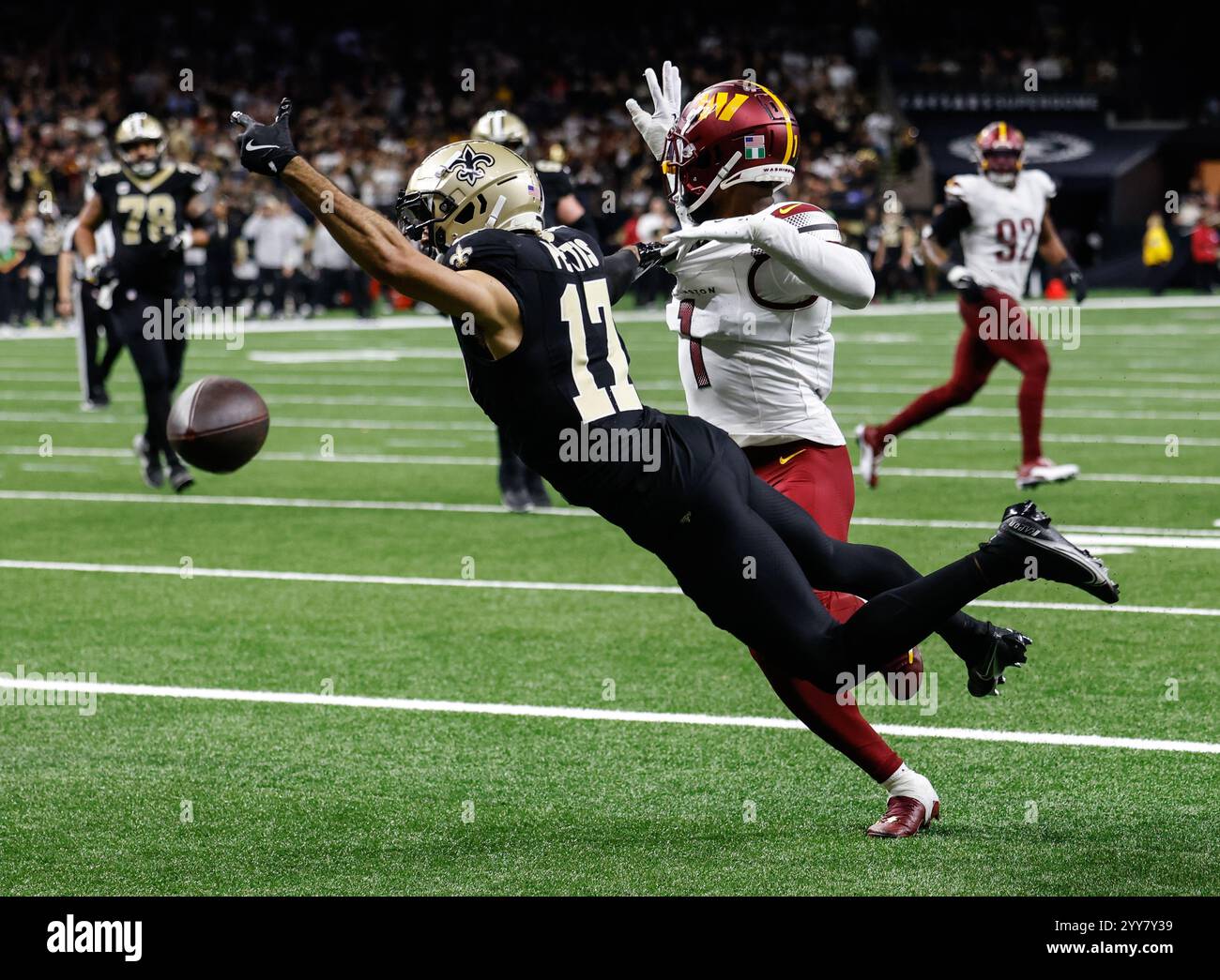 Washington Commanders cornerback Noah Igbinoghene (1) disrupts a pass to New Orleans Saints wide receiver Dante Pettis (17) at the Washington Commande Stock Photo