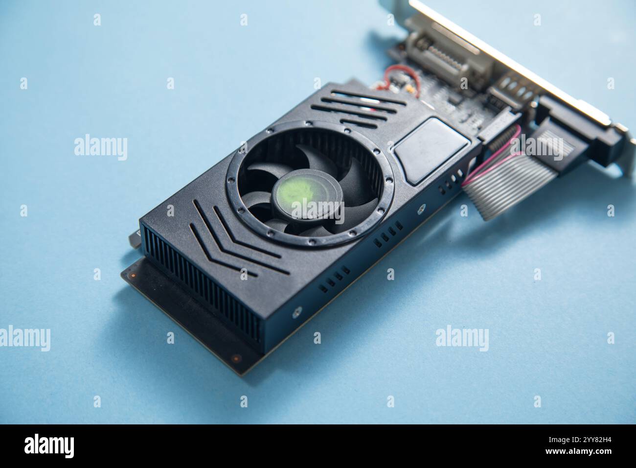 Computer graphics card on the blue background. Stock Photo