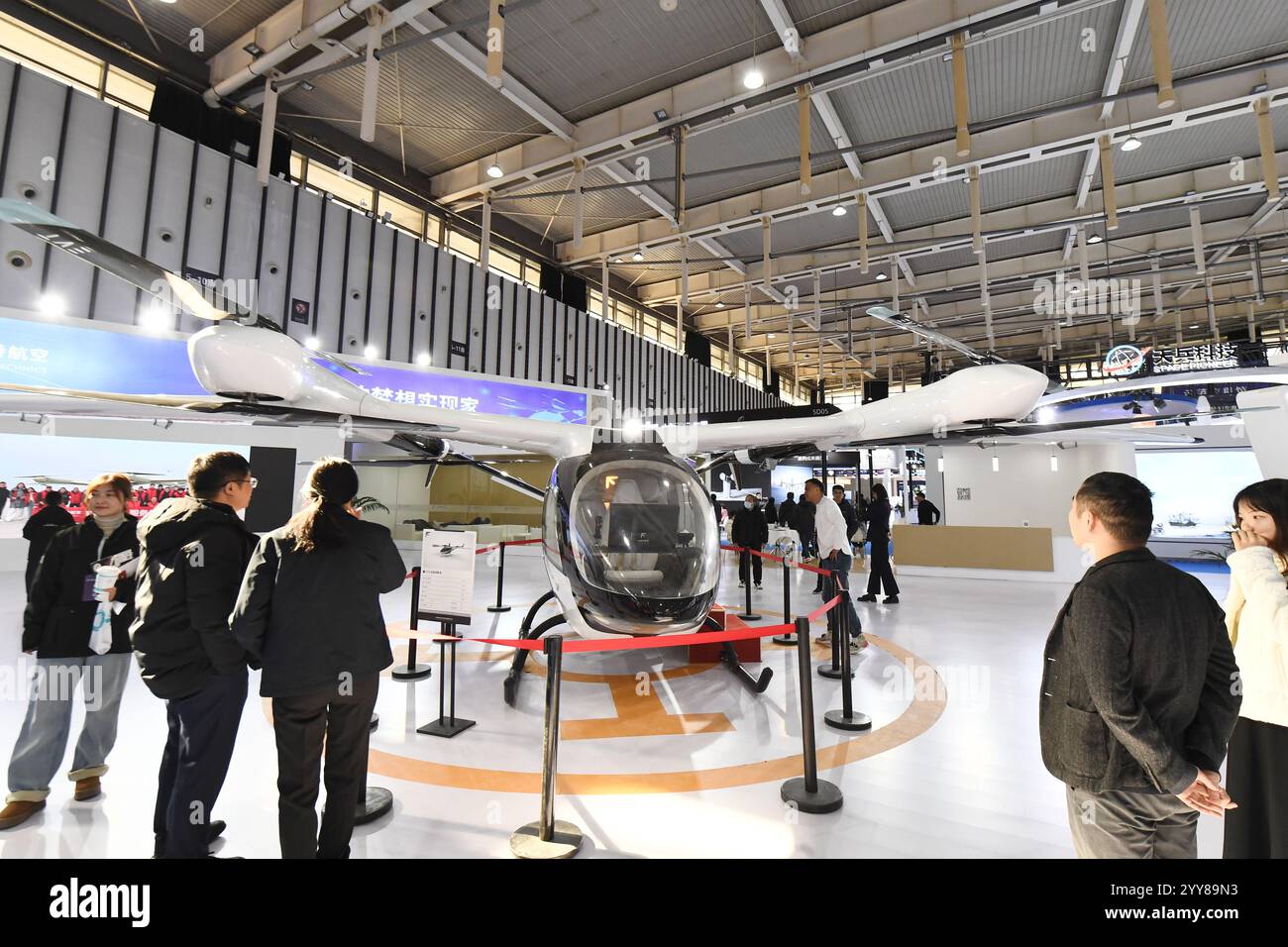 NANJING, CHINA DECEMBER 20, 2024 People visit a vertical drone on