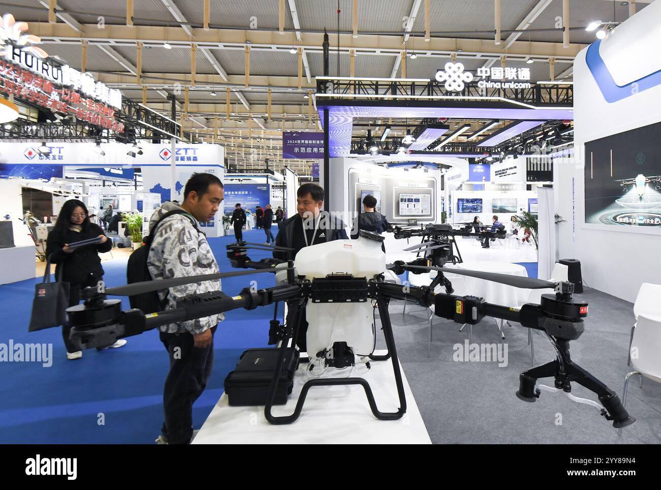 NANJING, CHINA DECEMBER 20, 2024 People visit a drone on display at
