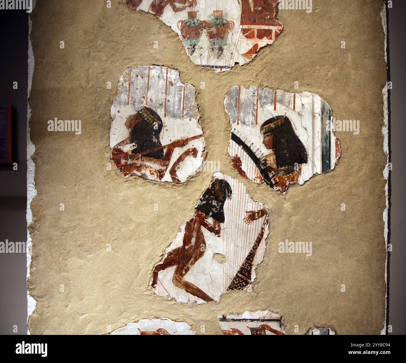 Mural painting. Funerary Chapels. 18th Dynasty. New Kingdom. (1480-1390 BC). Pouring wine into amphorae with a syphon, harvesting and laundering. Theb Stock Photo