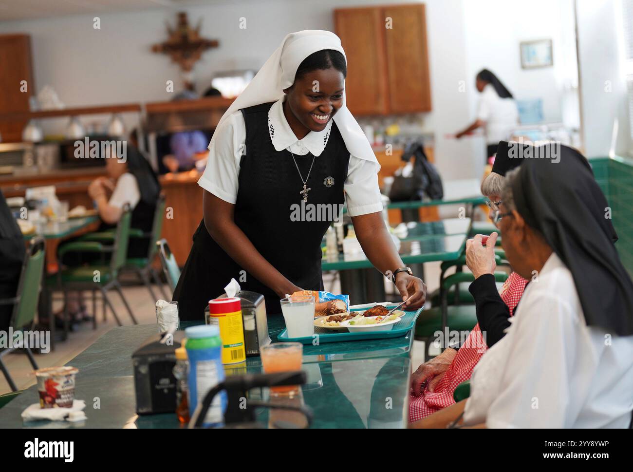 Sister Seyram Mary Adzokpa, of the Sisters of the Holy Family, brings a