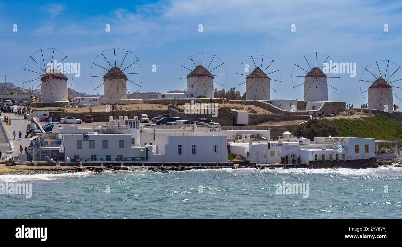 Iconic windmills of Mykonos overlooking the Aegean Sea. Coastal ...