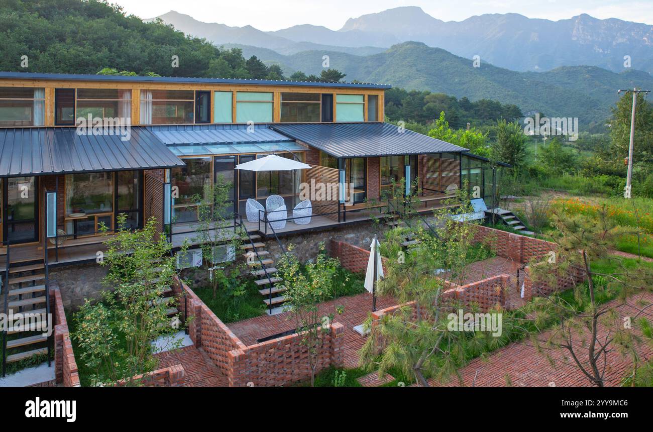 the rural Airbnb guest house with yard, mountain in the background ...
