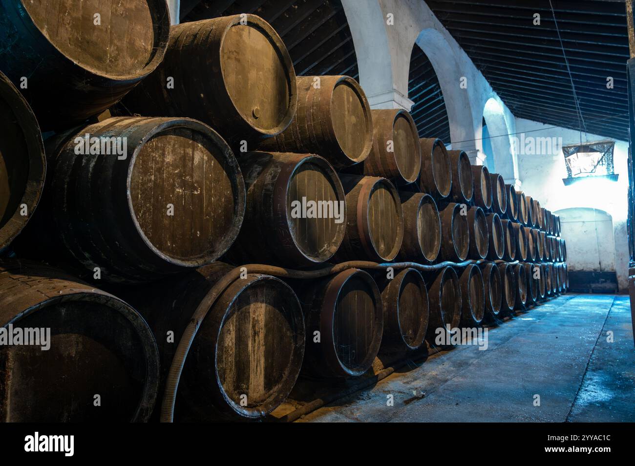 Solera systems in old Andalusian wine cellar, process for aging sherry ...