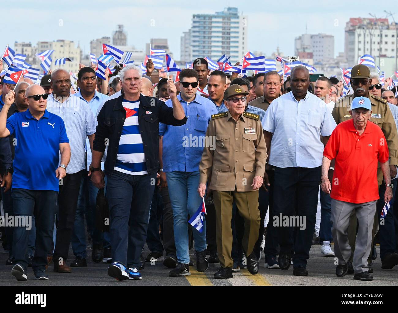 Cuban President Miguel Diaz-Canel, center left, and former President ...