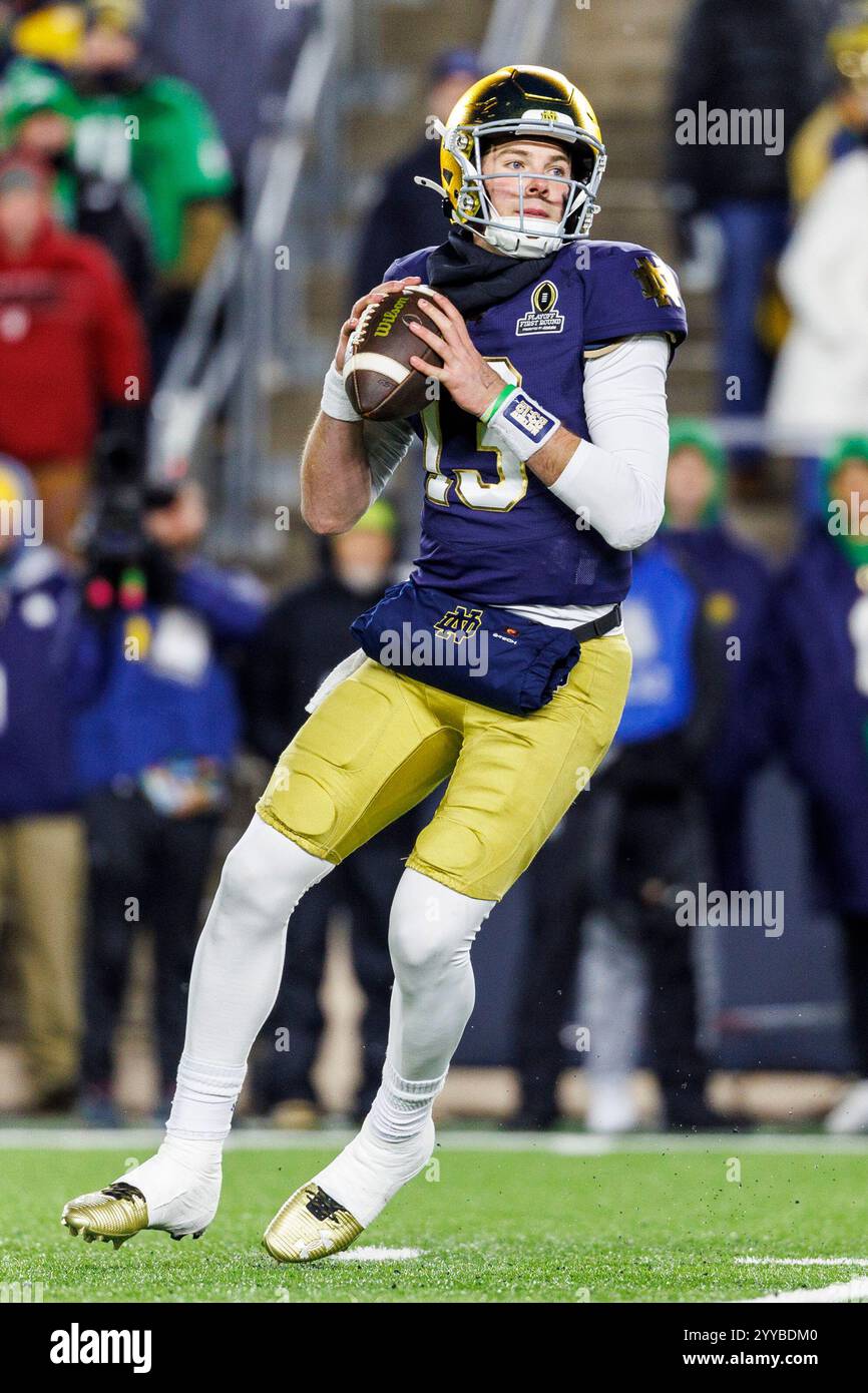 December 20, 2024 Notre Dame quarterback Riley Leonard (13) passes the