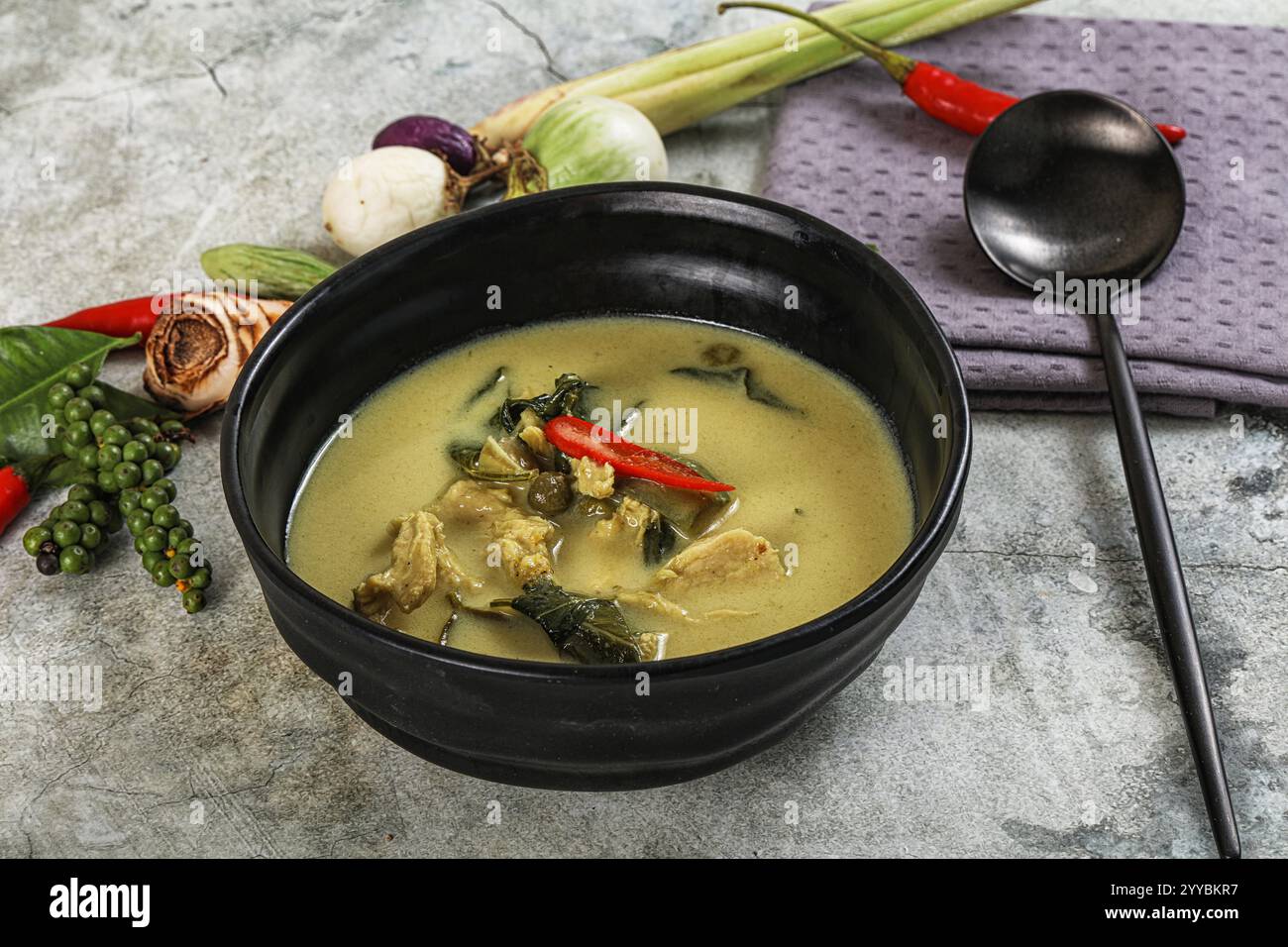 Thai green chicken curry with coconut milk and basil Stock Photo - Alamy