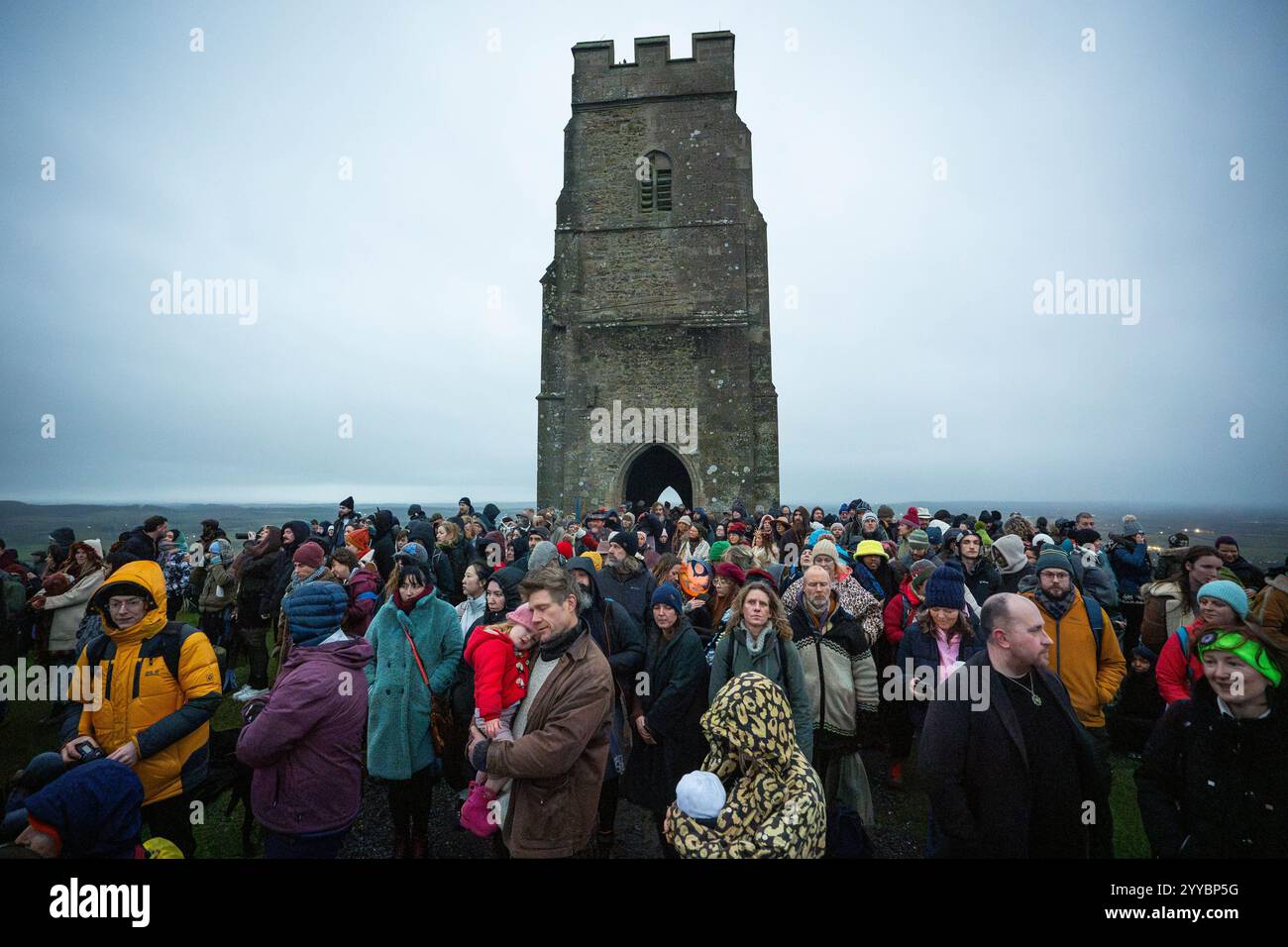 People take part in the winter solstice celebrations during sunrise at