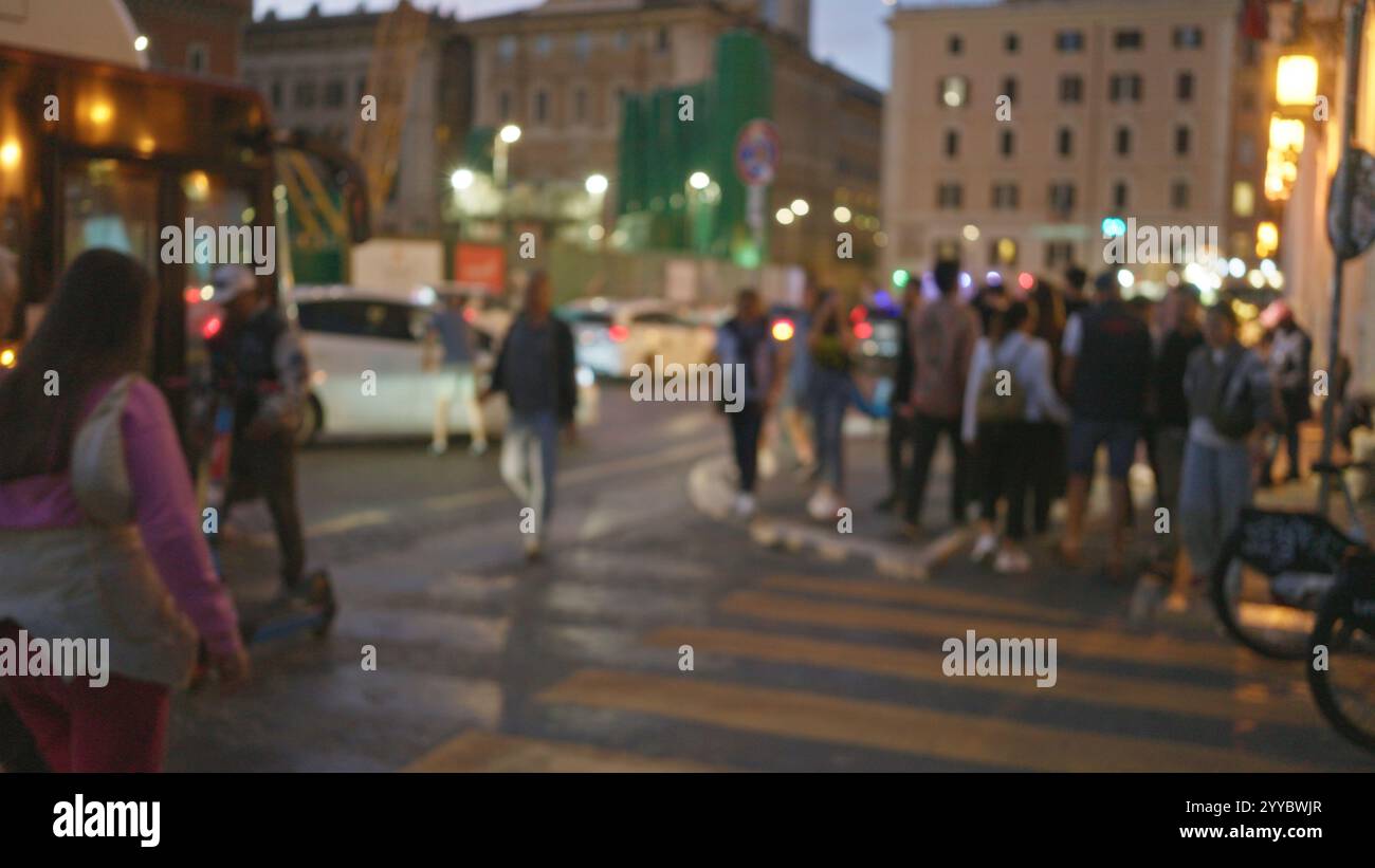 Night scene in rome's old town with blurred pedestrians and vibrant ...