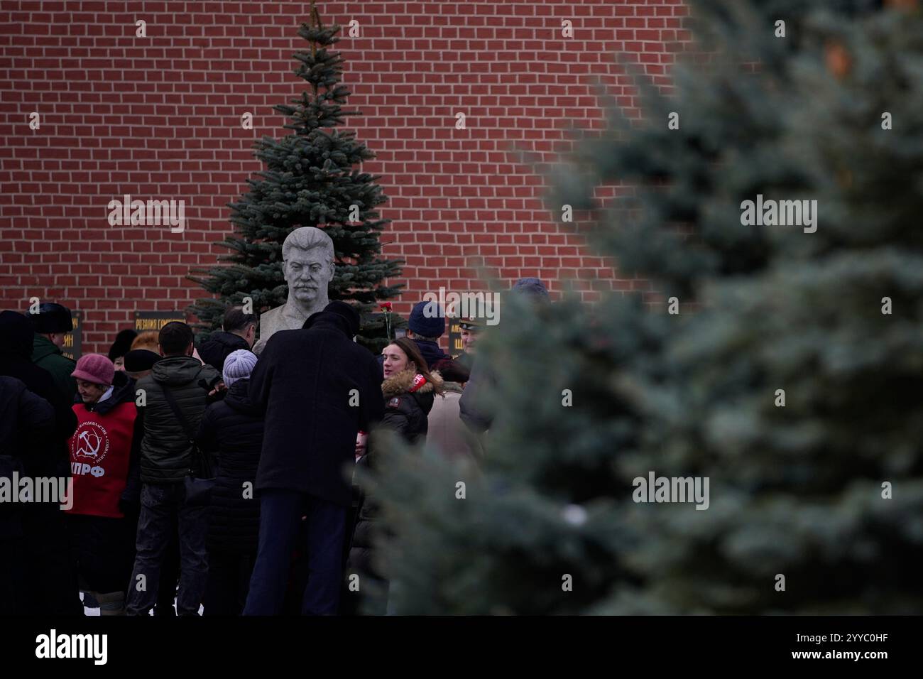 People gather at the grave of Soviet leader Joseph Stalin near the ...