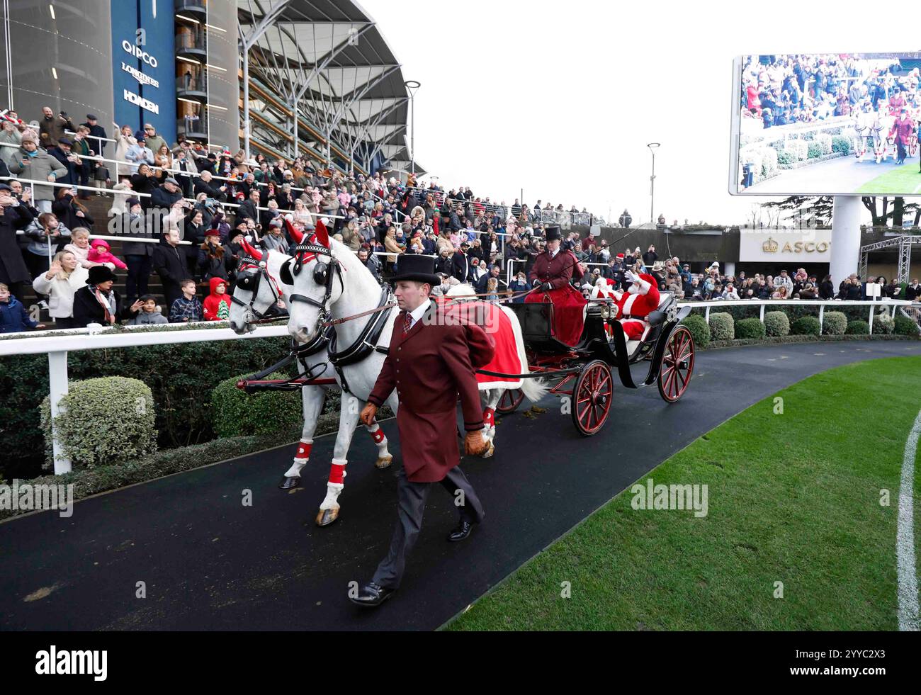Santa rides a carriage in the parade ring before the Howden Christmas ...
