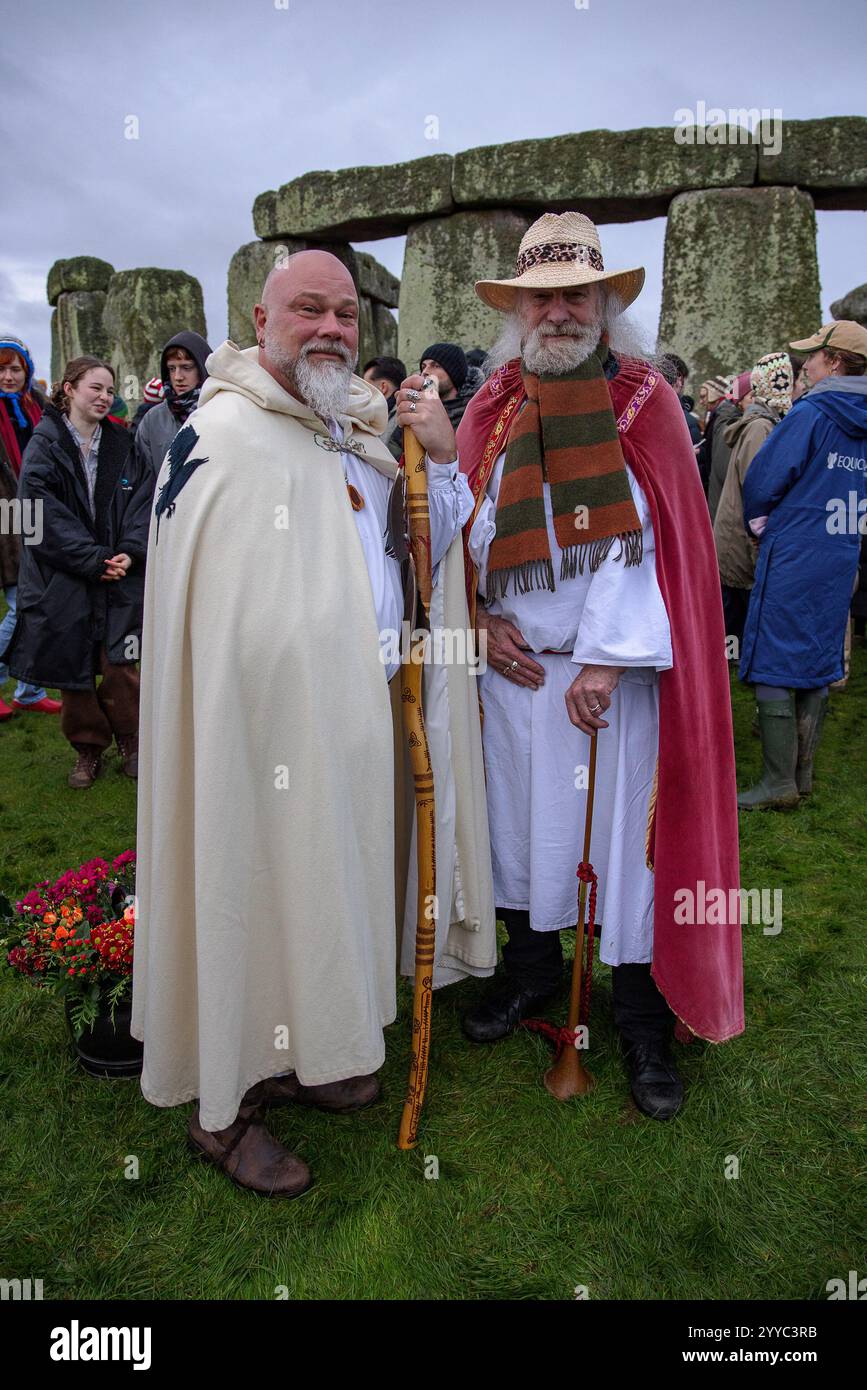 Salisbury, UK. 21st Dec, 2024. Druids celebrate at sunrise on the