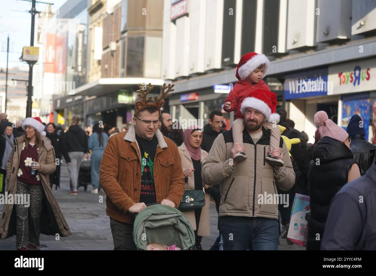 Shoppers in Newcastle ahead of Christmas Day on Wednesday. Picture date