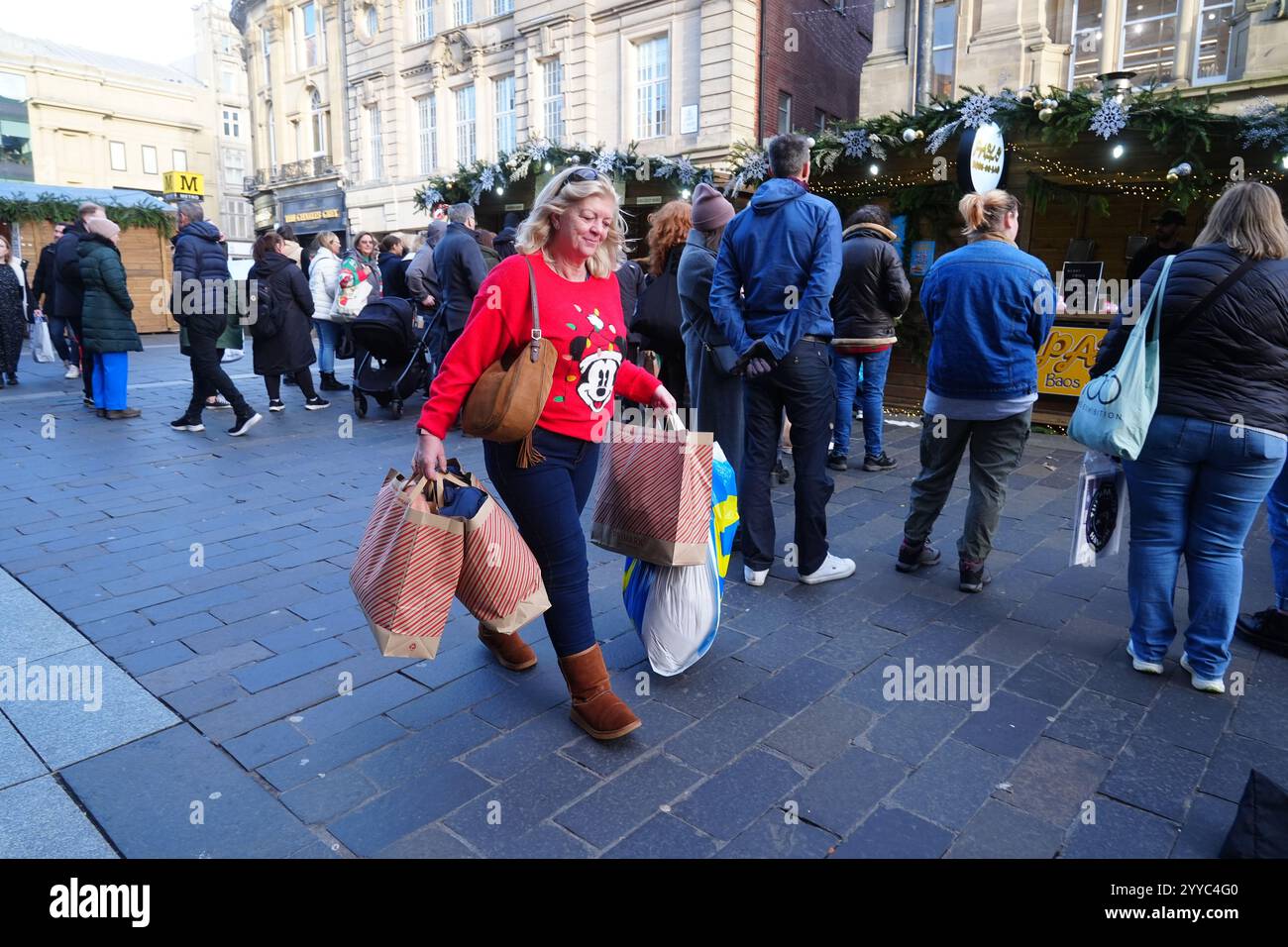 Shoppers in Newcastle ahead of Christmas Day on Wednesday. Picture date