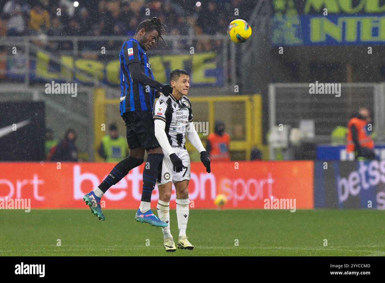 Italy, Milan, 20241219 Yann Bisseck (FC Inter) head shot battle in