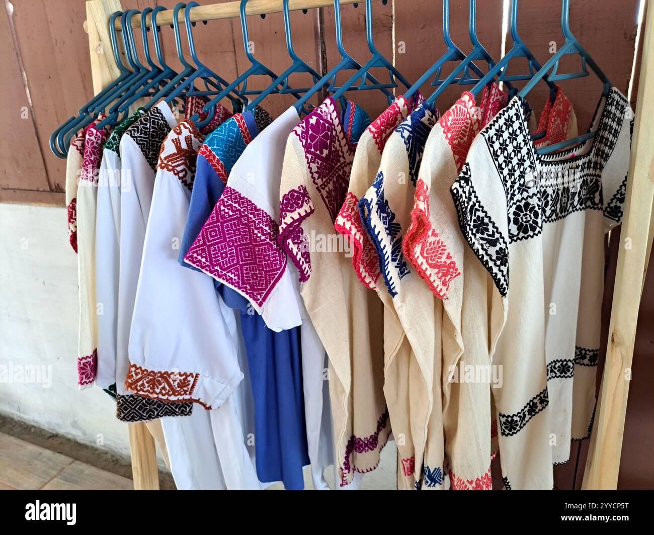 Xicotepec, Puebla - Jun 12 2022: Hand-embroidered blanket blouses in a traditional Mexican artisanal way Stock Photo