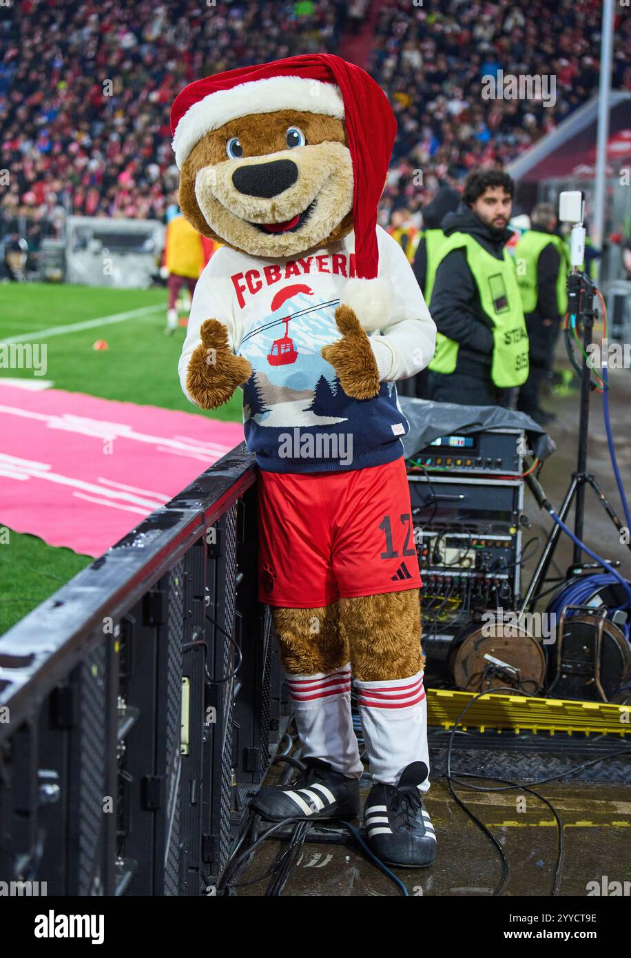 FCB mascot Bernie, Maskottchen, in the match FC BAYERN MUENCHEN - RB LEIPZIG 5-1 on Dec 20, 2024 in Munich, Germany. Season 2024/2025, 1.Bundesliga, FCB, Muenchen, matchday 15, 15.Spieltag Photographer: ddp images/star-images - DFL REGULATIONS PROHIBIT ANY USE OF PHOTOGRAPHS as IMAGE SEQUENCES and/or QUASI-VIDEO - Credit: ddp media GmbH/Alamy Live News Stock Photo