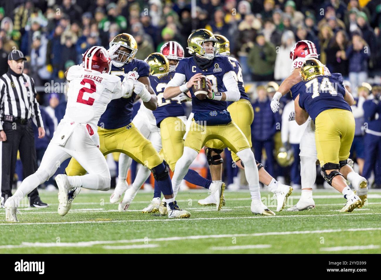 December 20, 2024 Notre Dame quarterback Riley Leonard (13) passes the