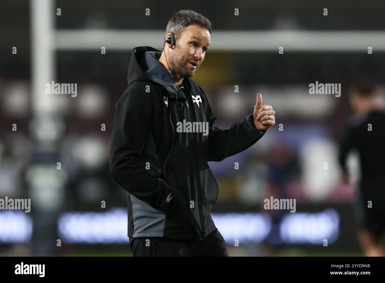 Swansea, UK. 21 December, 2024. Ospreys head coach Mark Jones before the Ospreys v Scarlets United Rugby Championship Match. Credit: Gruffydd Thomas/Alamy Stock Photo