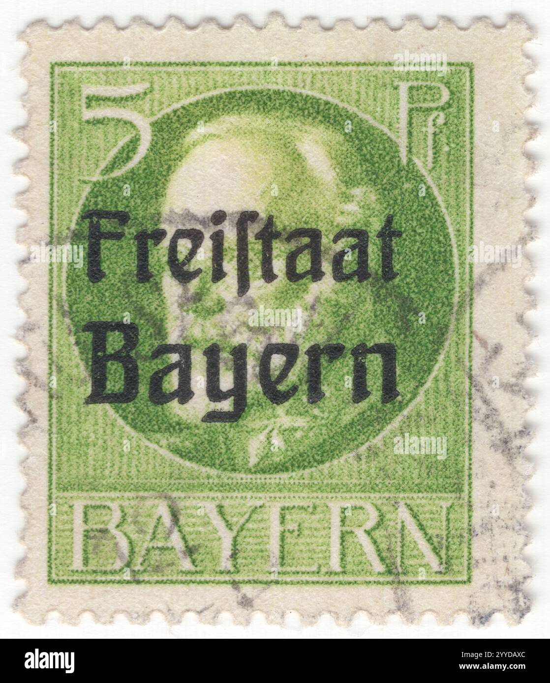 BAVARIA — 1919 August 22: 5 pfennig yellow-green postage stamp depicting portrait of King Ludwig III (07-Jan-1845 – 18-Oct-1921), the last King of Bavaria. Overprinted 'Freistaat Bayern'. Initially, he served in the Bavarian military as a lieutenant and went on to hold the rank of Oberleutnant during the Austro-Prussian War. He entered politics at the age of 18 becoming a member of the Bavarian parliament and was a keen participant in politics, supporting electoral reforms. Later in life, he served as regent and de facto head of state from 1912 to 1913, ruling for his cousin, Otto Stock Photo
