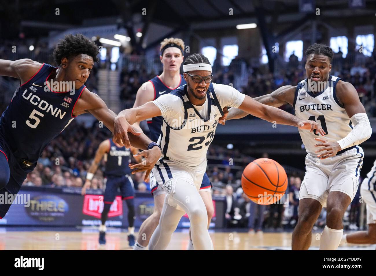Indy Reed Connecticut center Tarris Reed Jr. (5) and Butler center Andre Screen ...