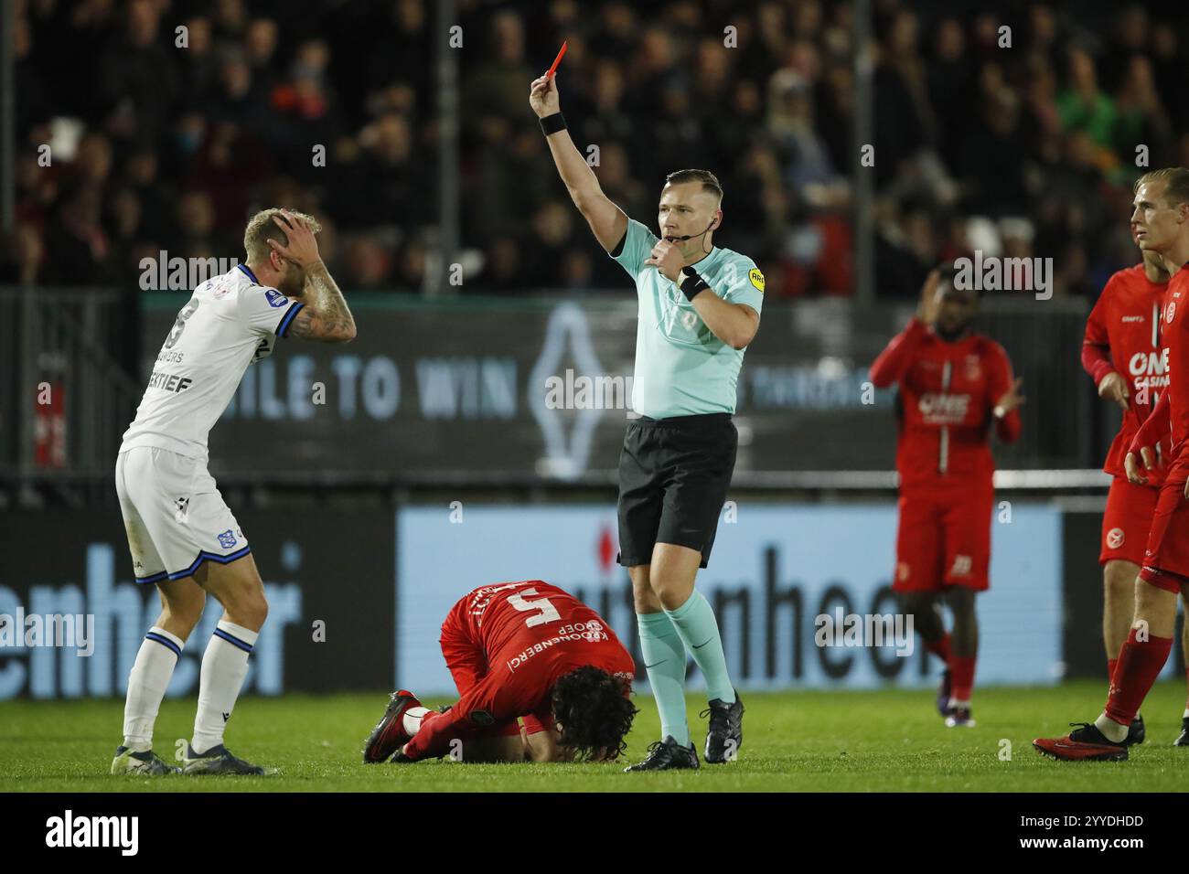 ALMERE - (l-r) Luuk Brouwers of sc Heerenveen, receives red card from referee Martijn Vos during the Dutch Eredivisie match between Almere City FC and SC Heerenveen at Almere City FC Stadium on Dec. 21, 2024 in Almere, Netherlands. ANP BART STOUTJESDIJK Stock Photo