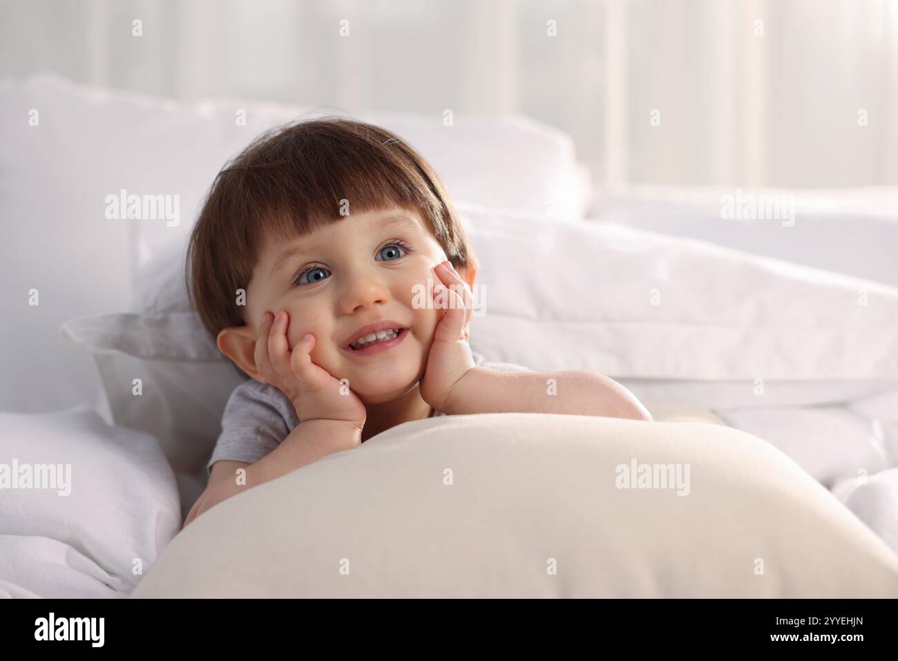 Cute little boy in bed at home Stock Photo - Alamy