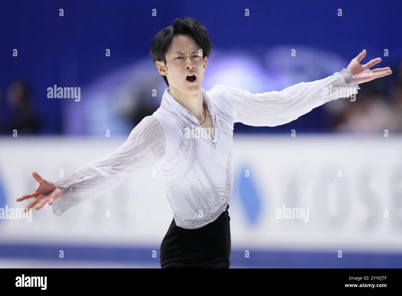Sota Yamamoto performs in the men's free program at the national figure