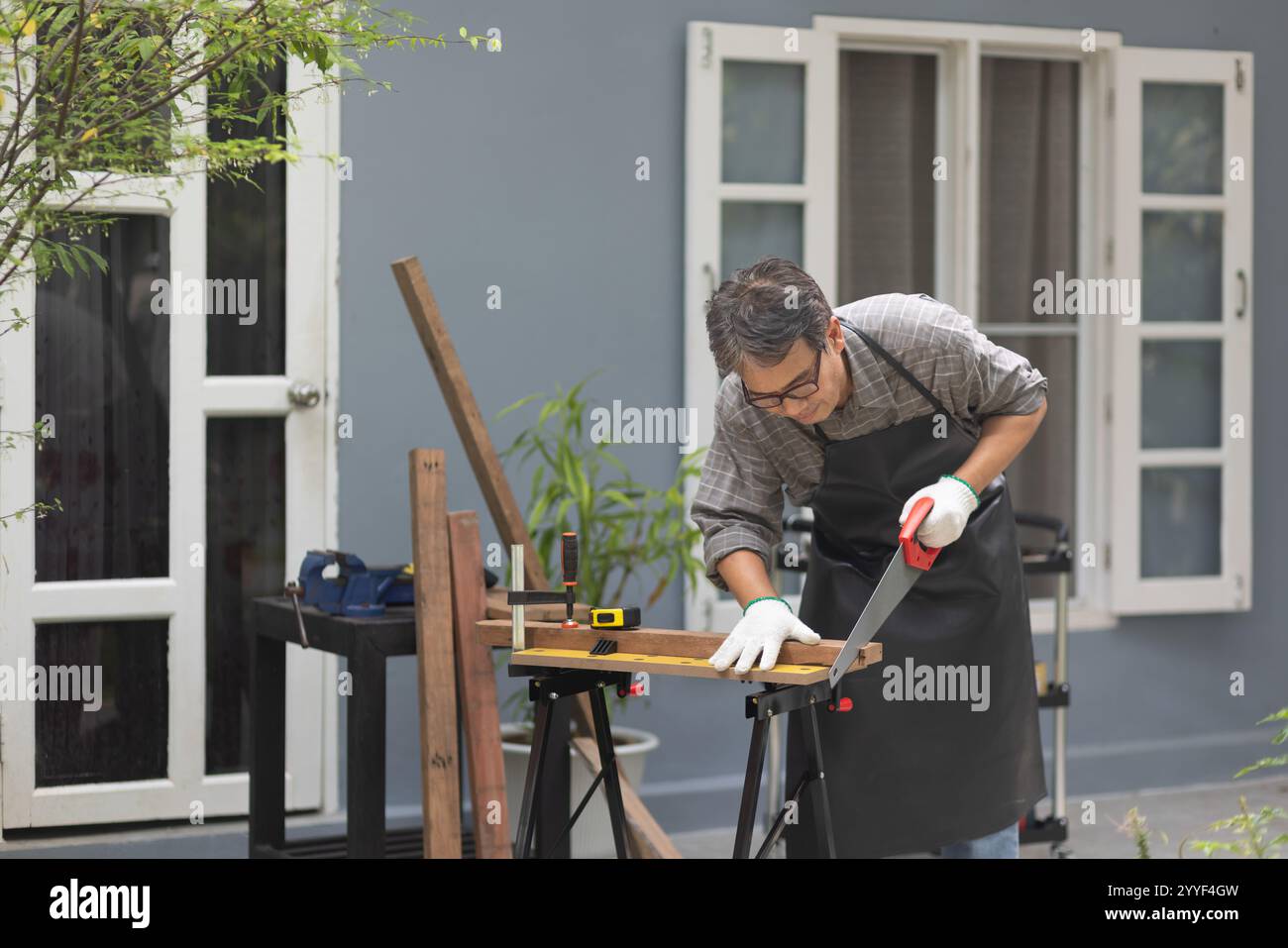 Curated visual reference: Woodworking Is A Hobby For Senior Male After Retirement At Photo Inspiration