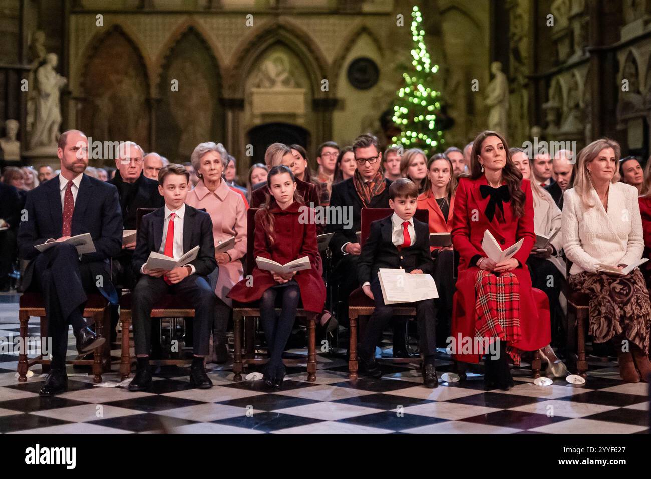 (front row, left to right) The Prince of Wales, Prince George, Princess Charlotte, Prince Louis, Princess of Wales and the Duchess of Edinburgh during the Together At Christmas carol service at Westminster Abbey in London. Picture date: Friday December 6, 2024. Stock Photo