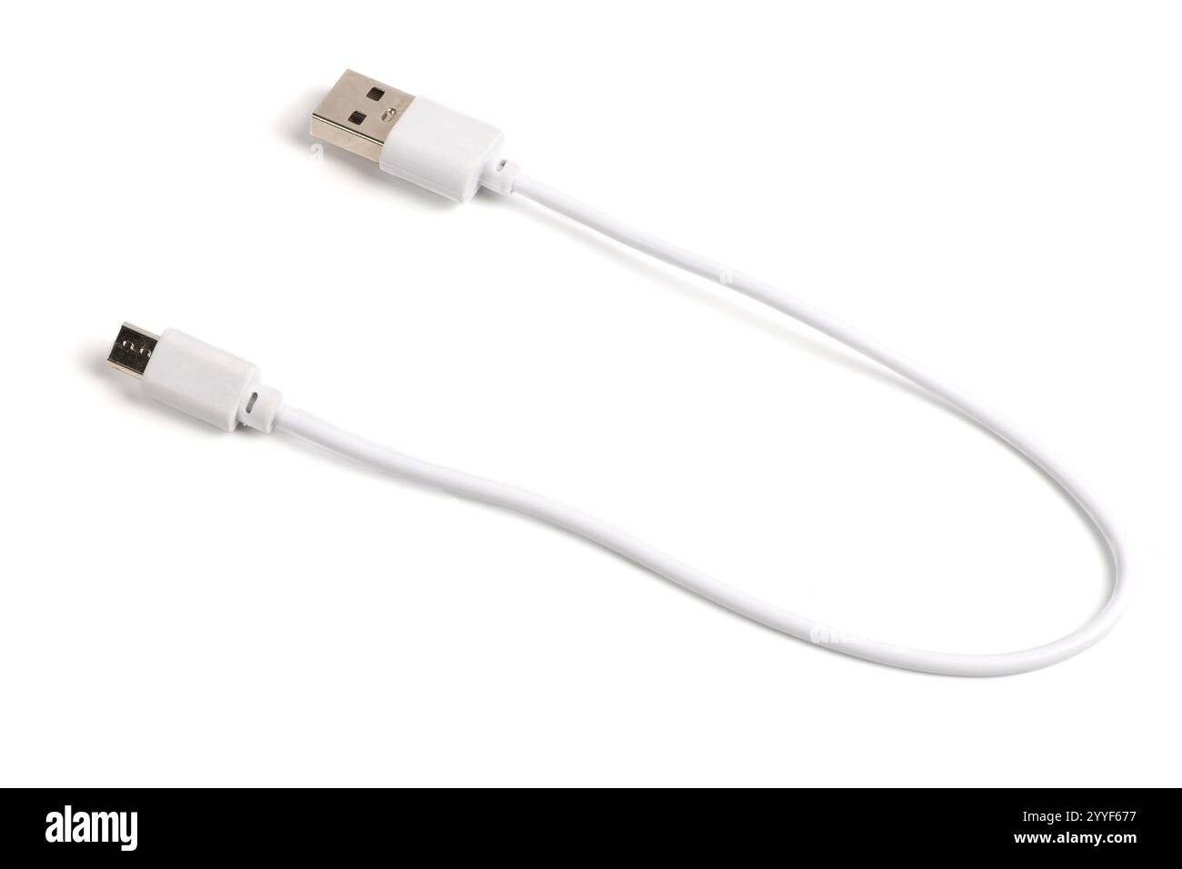 USB cable on a white background. USB and micro USB cable, on white background in insulation. Stock Photo