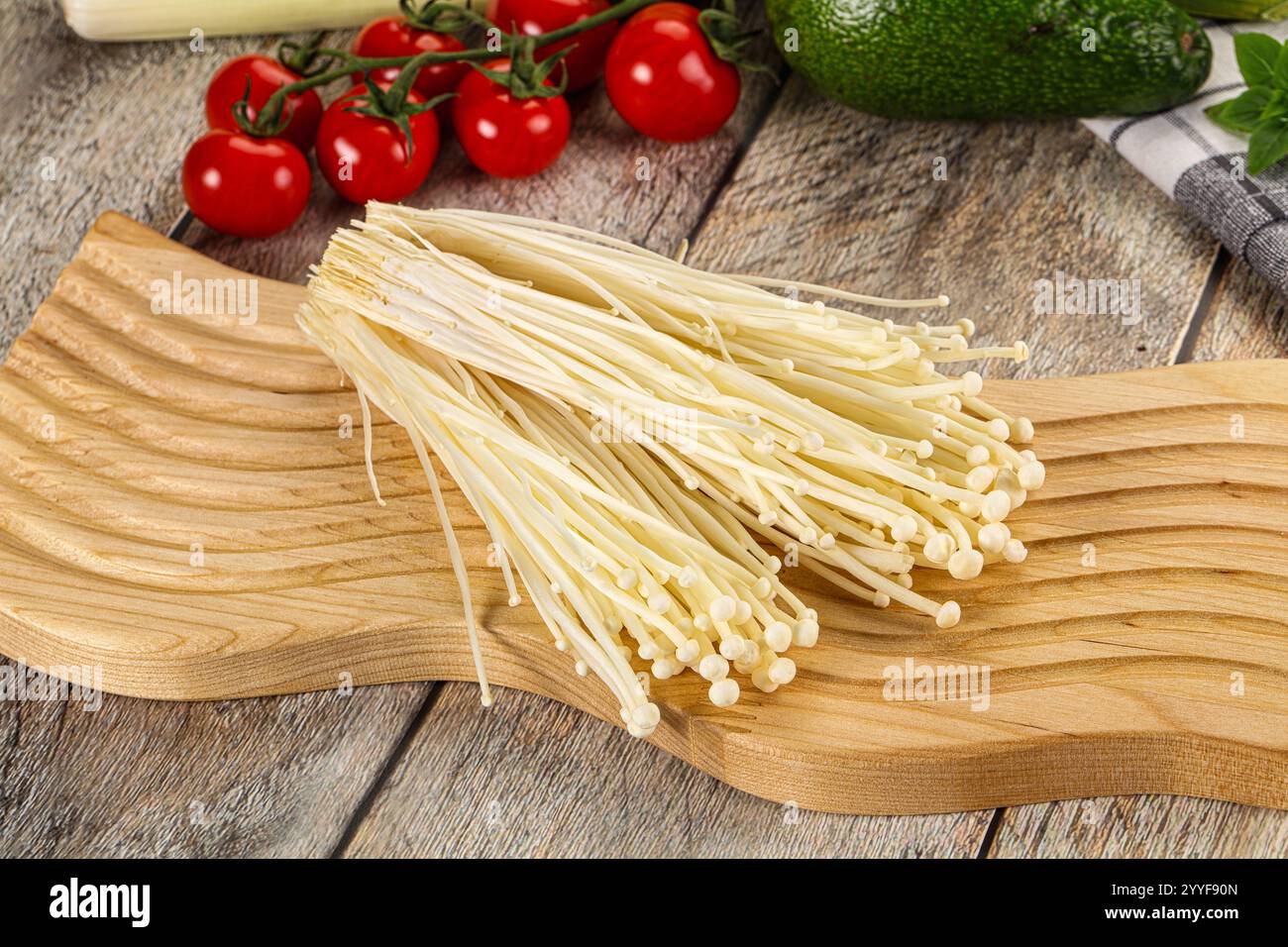 Raw fresh enoki mushroom for cooking Stock Photo - Alamy