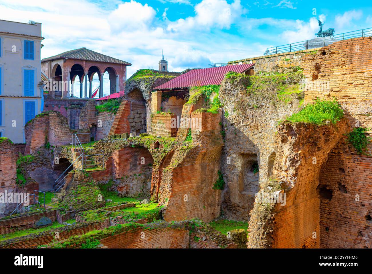 Ancient Roman ruins with weathered brick walls, arches, and greenery ...