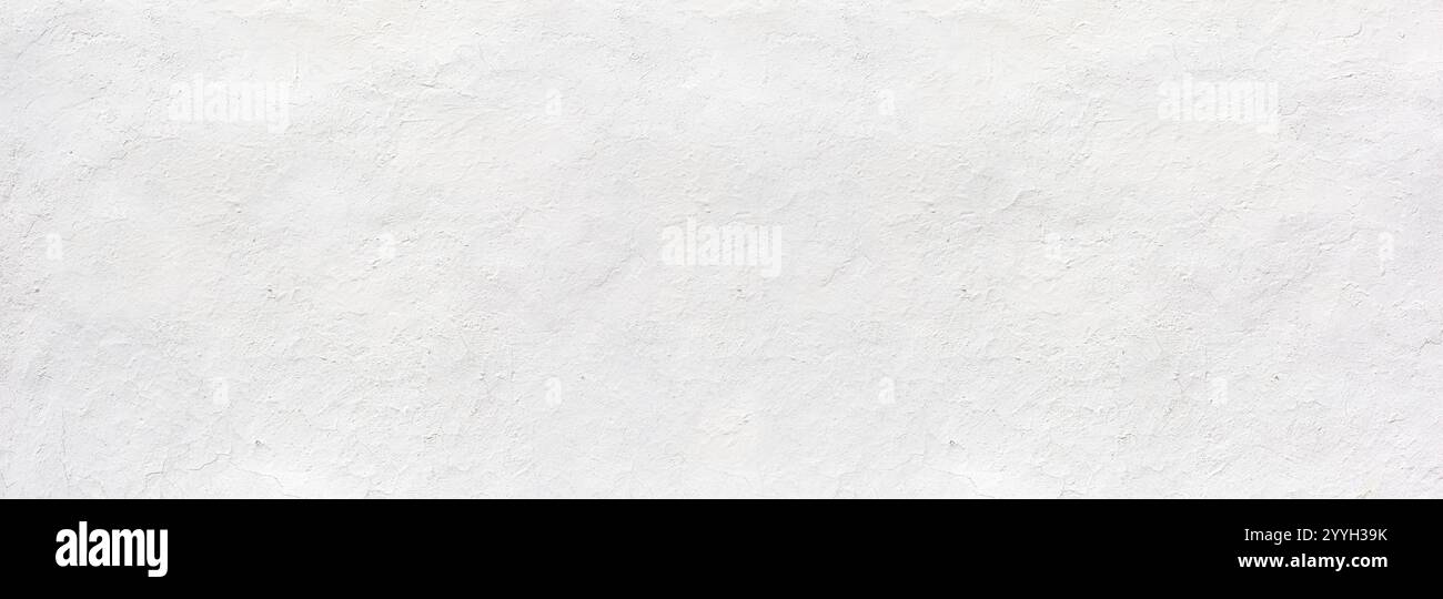 White rustic texture. Retro whitewashed surface of the old wall. Ancient structures. Grungy worn uneven painted plaster. Whiten the facade background Stock Photo