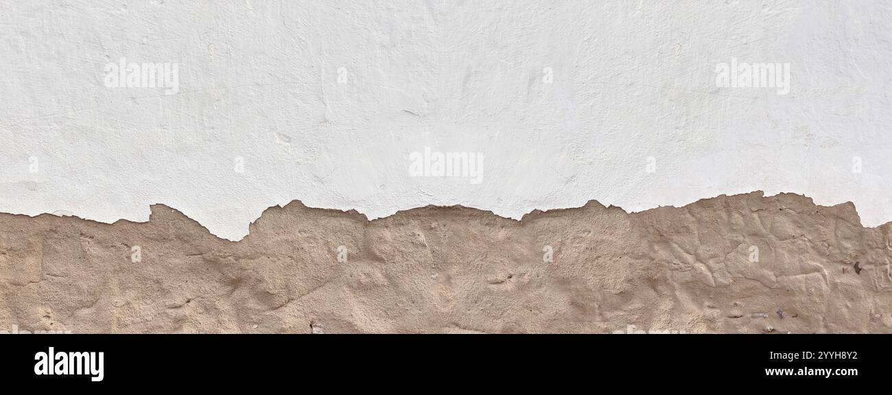 Damaged plaster wall panoramic background. Stock Photo