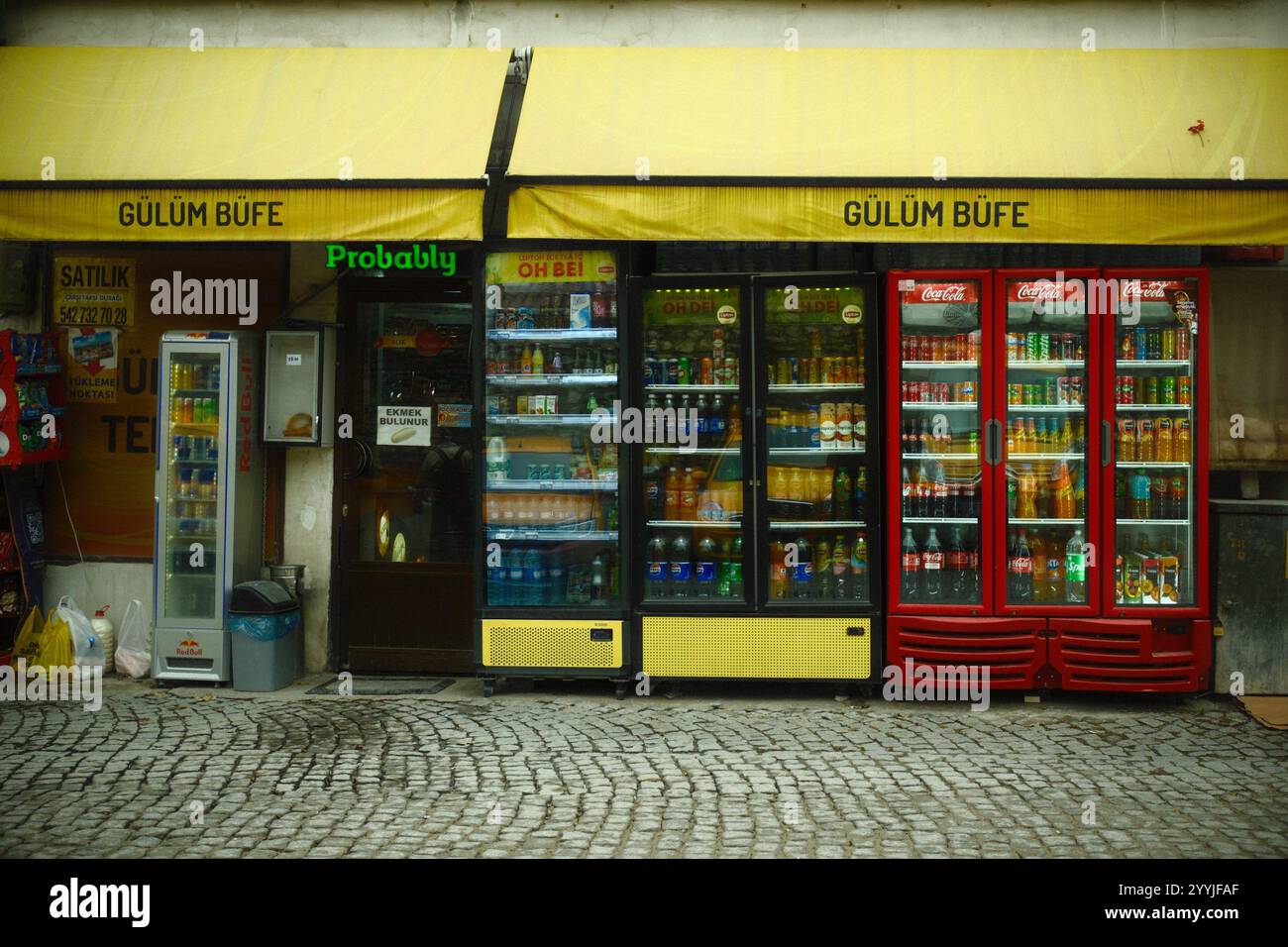 Balat, Istanbul, Turkey - November 28, 2024: A drink and snack kiosk with a variety of drink options in the display showcase fridge Stock Photo