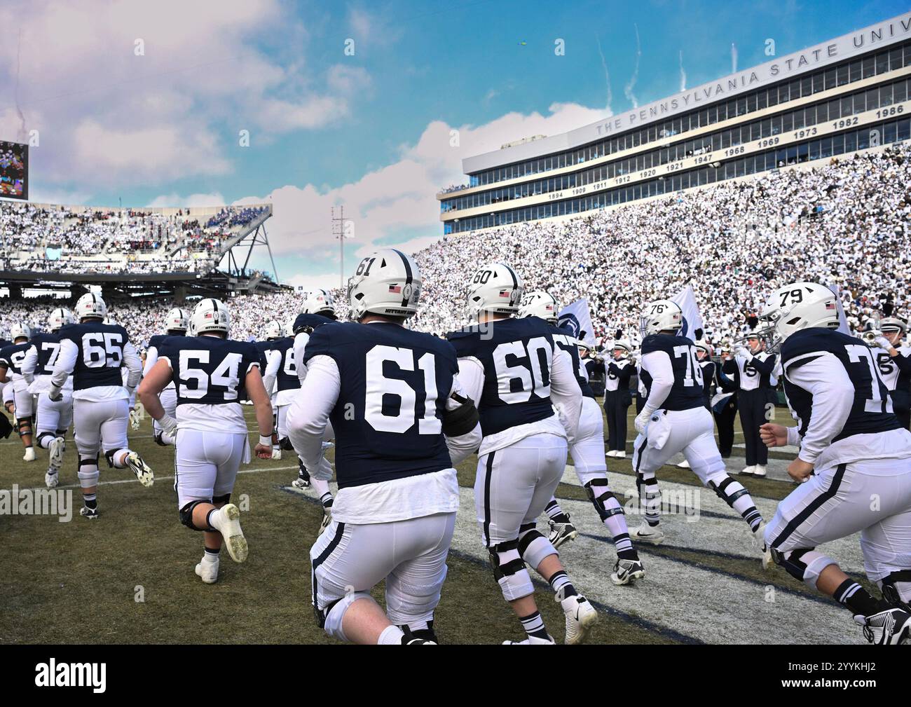 Penn State players take the field against SMU in the first round of the