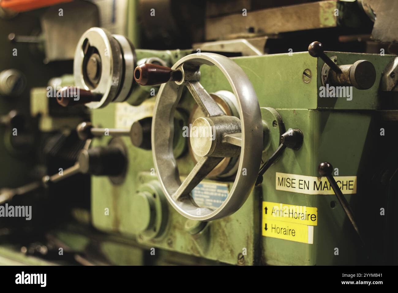 Old conventionnal lathe in a mechanical workshop Stock Photo