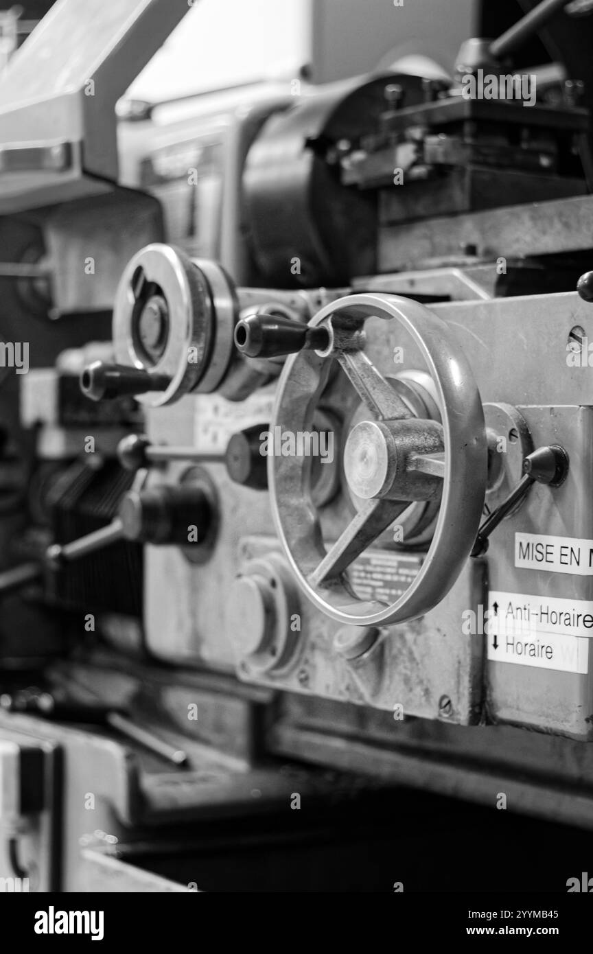 Old conventionnal lathe in a mechanical workshop Stock Photo