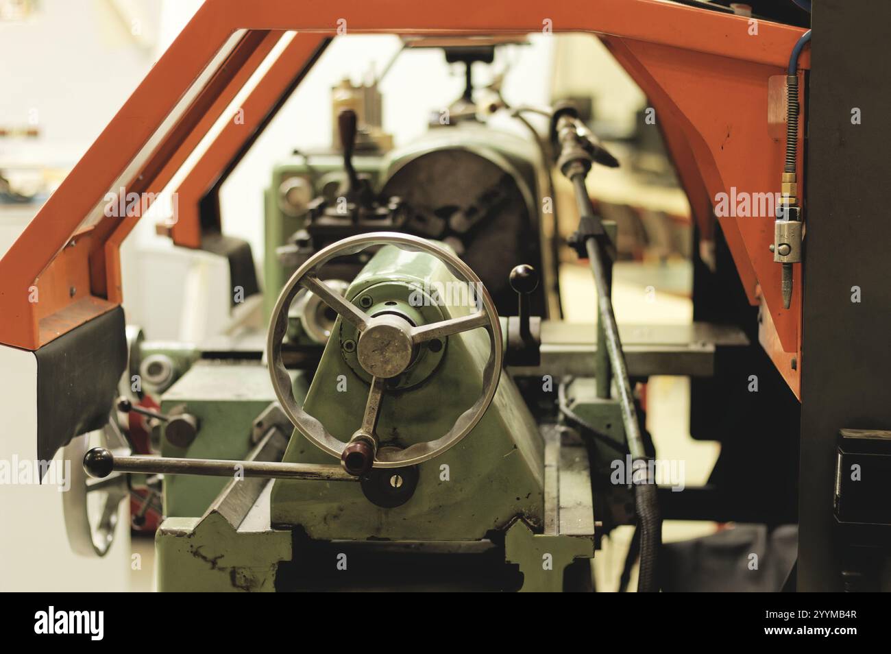 Old conventionnal lathe in a mechanical workshop Stock Photo