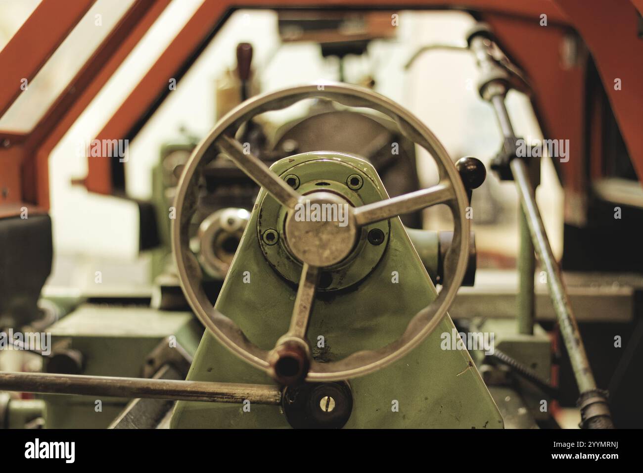 Old conventionnal lathe in a mechanical workshop Stock Photo