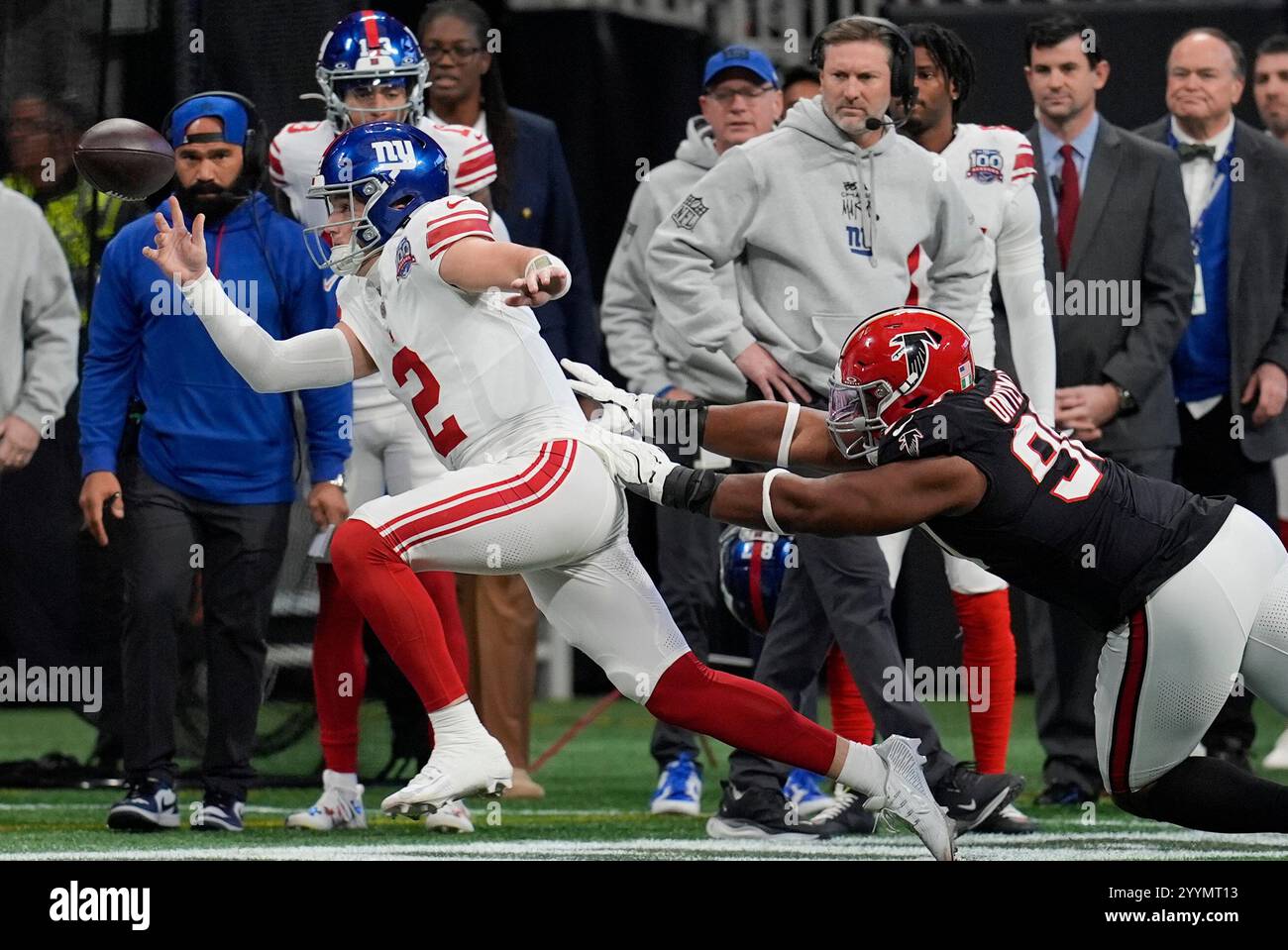 New York Giants quarterback Drew Lock (2) is knocked out of bounds by ...