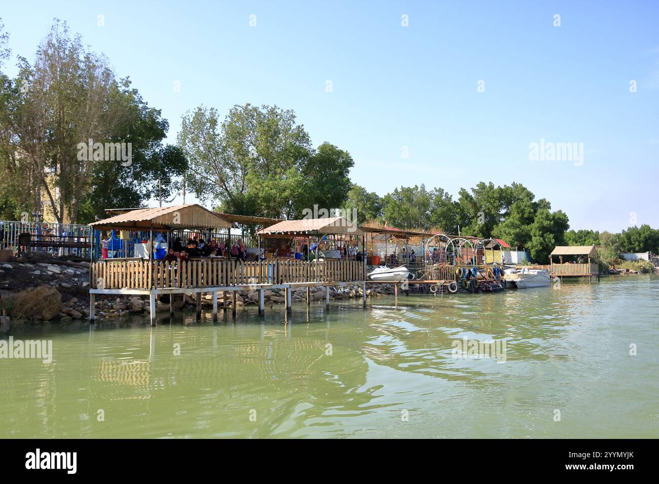 Al-Qurna, Basra in Iraq - November 11 2024: people at the Shatt al-Arab ...