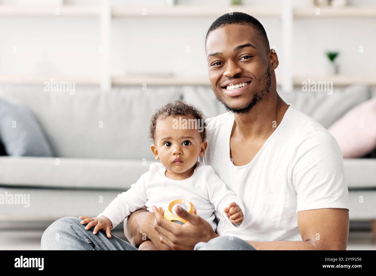Babies Development. Portrait Of Happy Black Father With Little Baby On ...
