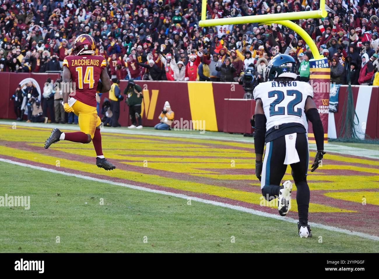 Washington Commanders wide receiver Olamide Zaccheaus (14) scores a ...